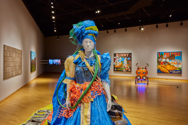 Installation view of Constant Storm exhibition at USF Contemporary Art Museum. Left to right: Art by Karlo Andrei Ibarra, Rogelio Báez Vega, Jezabeth Roca González, Wanda Raimundi-Ortiz and Miguel Luciano. Photo: Will Lytch.