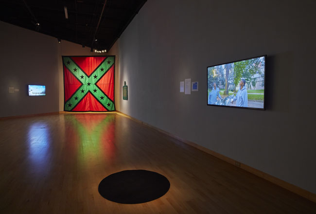 Installation View of Marking Monuments exhibition at USF Contemporary Art Museum. Left: John Sims. Right: Karyn Olivier. Photo: Will Lytch.