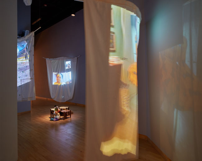 Installation view of Out To Pasture exhibition at USF Contemporary Art Museum. Left to right: Work by Nadia Ivanova,  Erin Oliver, Ian Wilson. Photo: Will Lytch.